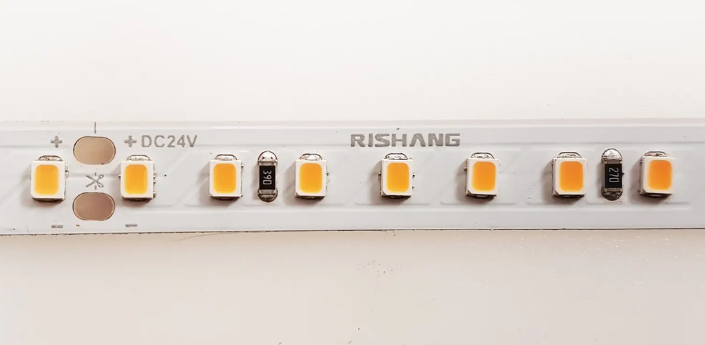 LED стрічка RISHANG 128-2835-24V-IP20 12W 1434Lm 3000K 5м (RD00C8TC-A-WW)